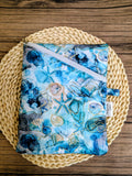 * Pochette protectrice en tissu imperméable